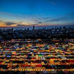 Art Bargain - aerial photography of city buildings during night time