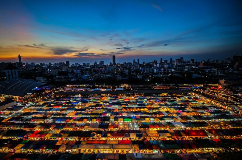 Art Bargain - aerial photography of city buildings during night time