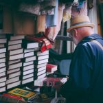 Book Bargain - man holding book