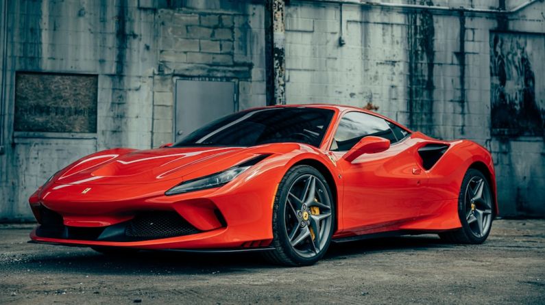 Luxury Car - red ferrari 458 italia parked near gray building