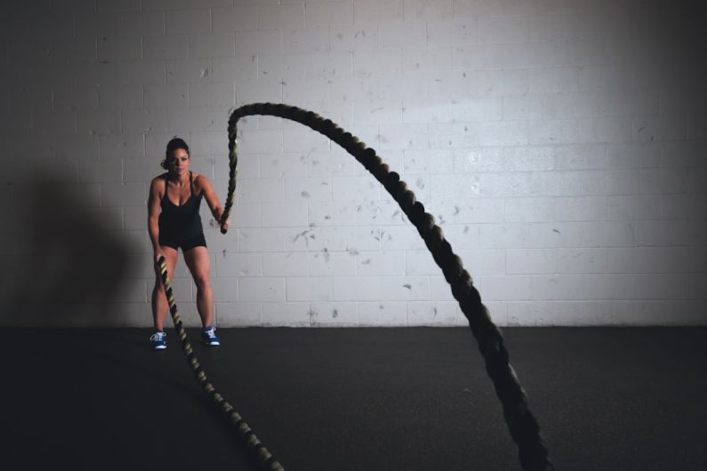 Workout Wear Favorite - woman holding brown ropes