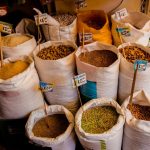 Bulk Shopping - a bunch of bags filled with different types of food