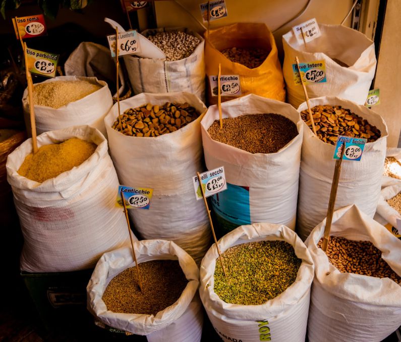 Bulk Shopping - a bunch of bags filled with different types of food