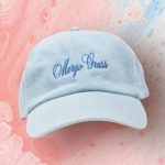 Celebrity Fashion - a blue cap with the word cheap brass embroidered on it