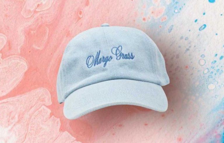 Celebrity Fashion - a blue cap with the word cheap brass embroidered on it