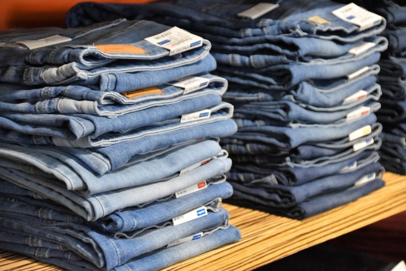 Accessories Trend - pile of blue denim jeans lot