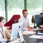 Home Office Tech - man sitting in front of table