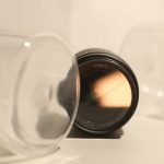 Gaming Gear - a close up of a camera lens on a table
