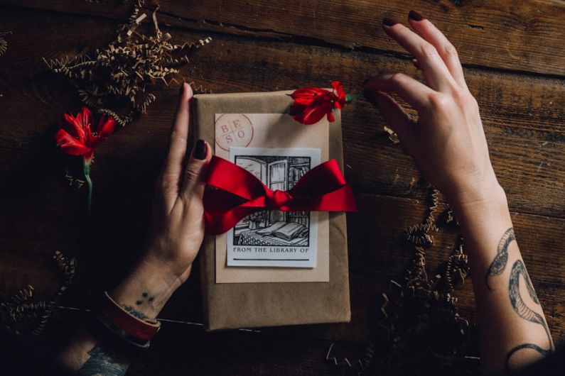 Book Gift - red ribbon on white greeting card